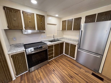 COMPLETLEY REMODELED INSIDE!!! Candlelight Manor offers a - photo 6