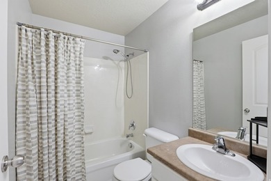 This bright and inviting 3-bedroom, 2-bathroom condo offers the - photo 19