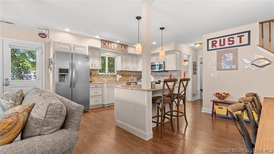 Designed with gathering in mind, this unique lake home was - photo 25