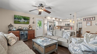 Designed with gathering in mind, this unique lake home was - photo 27