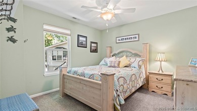 Designed with gathering in mind, this unique lake home was - photo 46