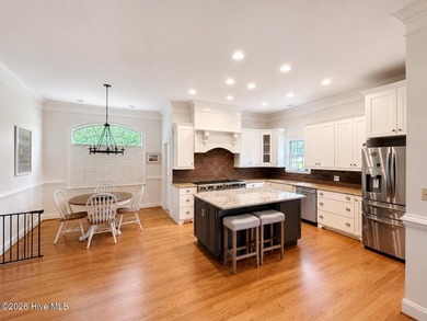 A picturesque tree-lined driveway welcomes you home, setting the - photo 9