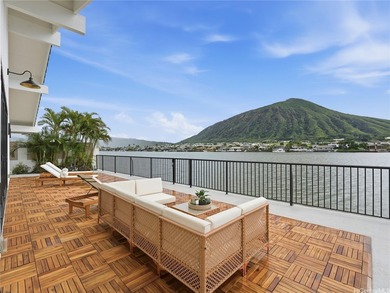 Beyond the palms and calm marina waters, this meticulously - photo 20