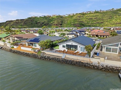 Beyond the palms and calm marina waters, this meticulously - photo 22