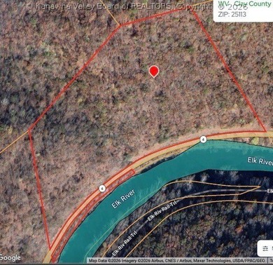 Tucked along a sweeping bend of the Elk River, this 37-acre West - photo 1