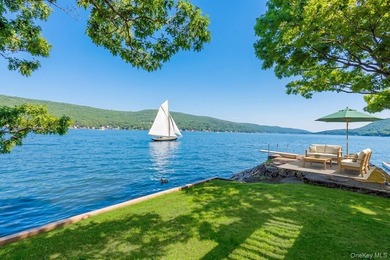 Rule Your Waterfront: West Cove's Crown Jewel Estate. Prepare to - photo 1