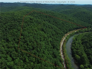 Tucked along a sweeping bend of the Elk River, this 37-acre West - photo 3