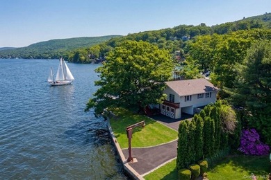 Rule Your Waterfront: West Cove's Crown Jewel Estate. Prepare to - photo 4
