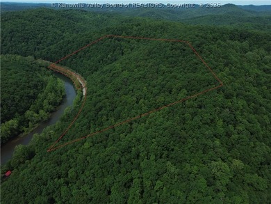 Tucked along a sweeping bend of the Elk River, this 37-acre West - photo 5