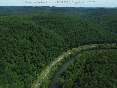 Tucked along a sweeping bend of the Elk River, this 37-acre West - photo 6