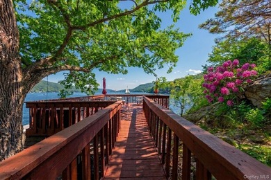 Rule Your Waterfront: West Cove's Crown Jewel Estate. Prepare to - photo 6
