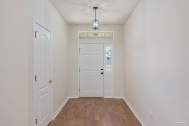Welcome to coastal living in Navarre! This beautiful 3-bedroom - photo 3