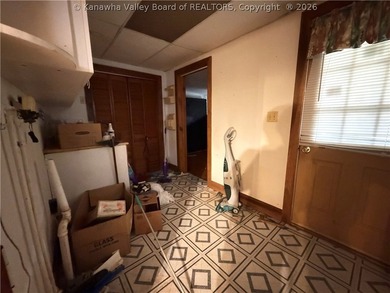 Step into this abundance of potential! This two bed one bath - photo 6