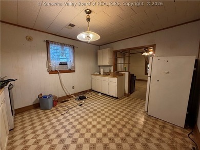 Step into this abundance of potential! This two bed one bath - photo 7