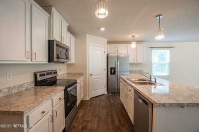 Welcome home to this well maintained 4-bed/ 2-bath residence in - photo 11