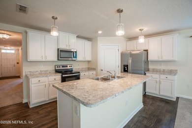 Welcome home to this well maintained 4-bed/ 2-bath residence in - photo 12