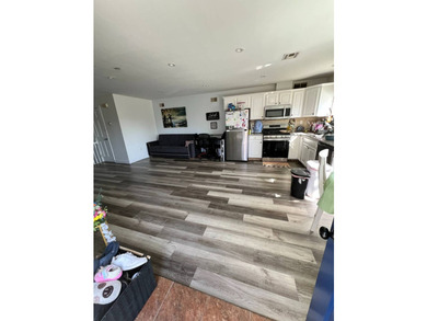 Come see this two family 2600+ square foot home. Main unit - photo 12