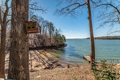 A mid-century modern lake home with breath taking wide views of - photo 3