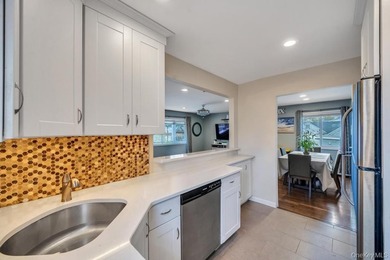 Welcome to this beautifully updated Hi-Ranch located in the - photo 12