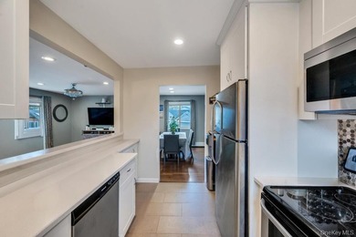 Welcome to this beautifully updated Hi-Ranch located in the - photo 13