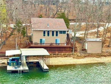 Lakefront living in the heart of Osage Beach at the 21MM! This