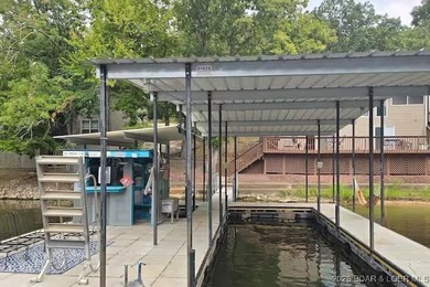 Lakefront living in the heart of Osage Beach at the 21MM! This