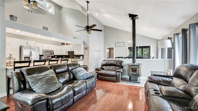 Lakefront living in the heart of Osage Beach at the 21MM! This