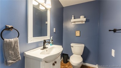 Lakefront living in the heart of Osage Beach at the 21MM! This