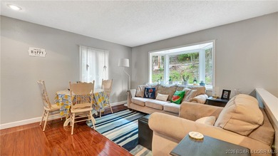 Lakefront living in the heart of Osage Beach at the 21MM! This