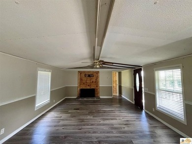 A budget-friendly mobile home on 0.27 acres inside city limits - photo 13