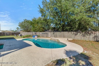 A home with a backyard and in-ground pool on a cul de sac. Check - photo 16