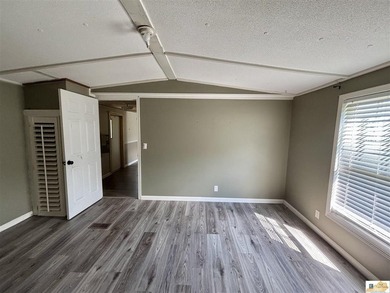 A budget-friendly mobile home on 0.27 acres inside city limits - photo 19