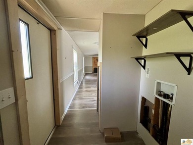 A budget-friendly mobile home on 0.27 acres inside city limits - photo 20