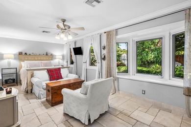 Tucked behind an arched gate on one of Palm Trail's most coveted - photo 26