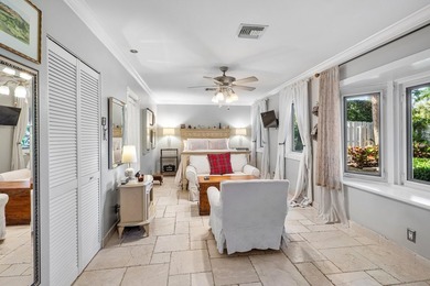 Tucked behind an arched gate on one of Palm Trail's most coveted - photo 27