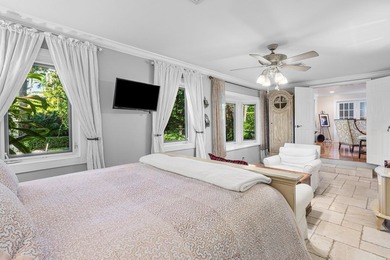 Tucked behind an arched gate on one of Palm Trail's most coveted - photo 28