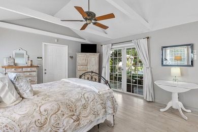 Tucked behind an arched gate on one of Palm Trail's most coveted - photo 38