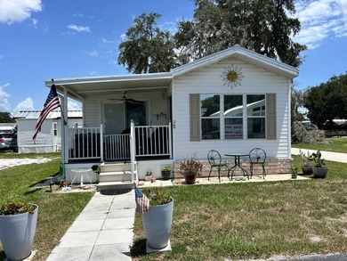 ADORABLE PARK MODEL with vinyl plank flooring, tinted windows - photo 1