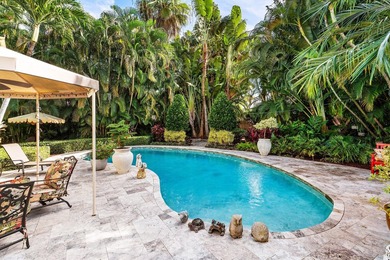 Tucked behind an arched gate on one of Palm Trail's most coveted - photo 43
