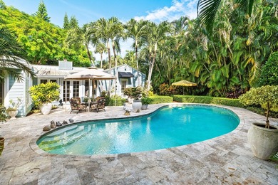 Tucked behind an arched gate on one of Palm Trail's most coveted - photo 44