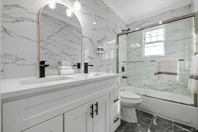 Welcome to this stunning duplex, meticulously done with high-end - photo 8