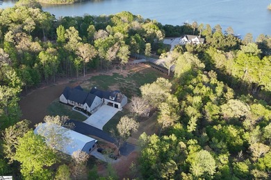 Welcome to a private gated lake-view estate in Seneca where - photo 3