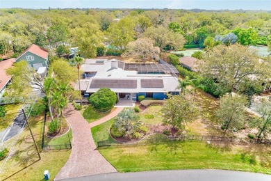 Rare nearly one acre estate in the heart of Clearwater, this