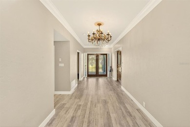 Rare nearly one acre estate in the heart of Clearwater, this