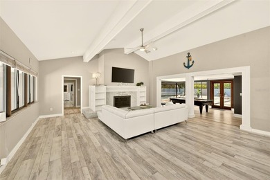 Rare nearly one acre estate in the heart of Clearwater, this