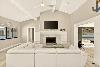 Rare nearly one acre estate in the heart of Clearwater, this