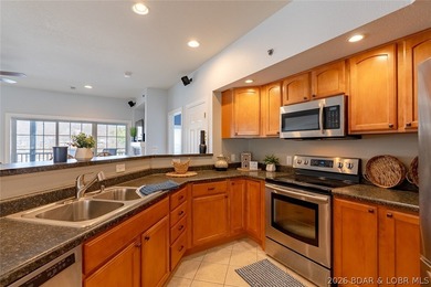 This beautiful walk-in unit is located in a well-known gated