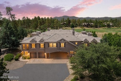 Experience elevated, low-maintenance living in the prestigious - photo 2