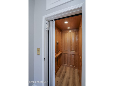 Experience elevated, low-maintenance living in the prestigious - photo 3
