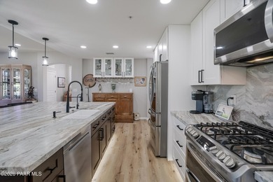 Experience elevated, low-maintenance living in the prestigious - photo 5